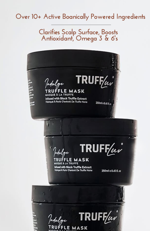 Close-up of glossy dark hair treated with a rich repair mask.
